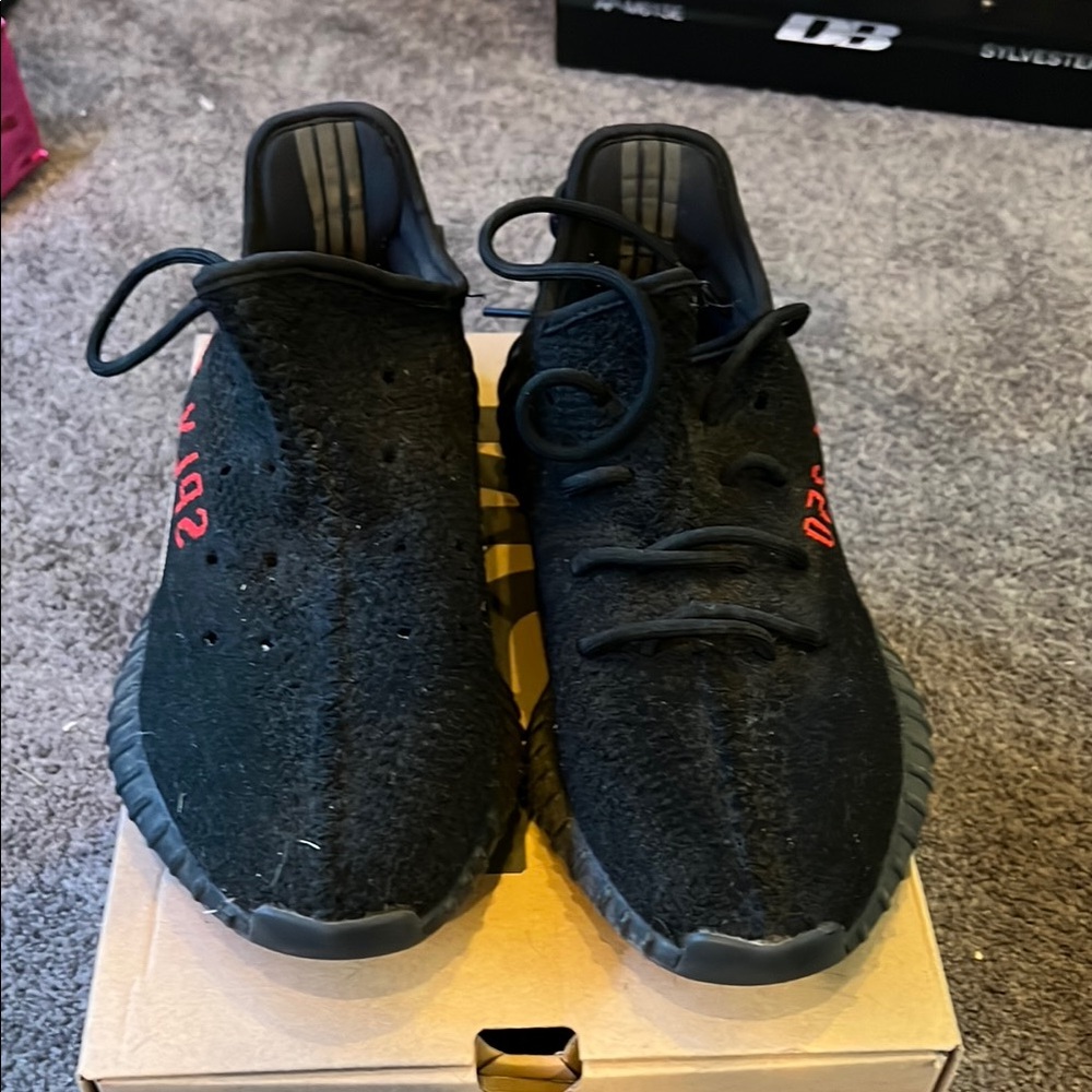 Yeezy Black and Red Athletic Shoes with Knitted Upper and Thick Sole
